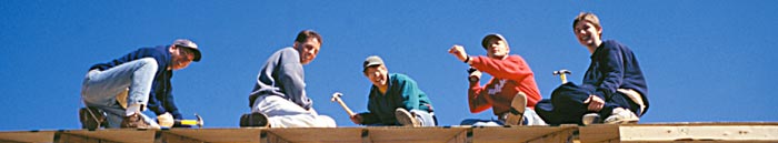 Photo of men on roof.